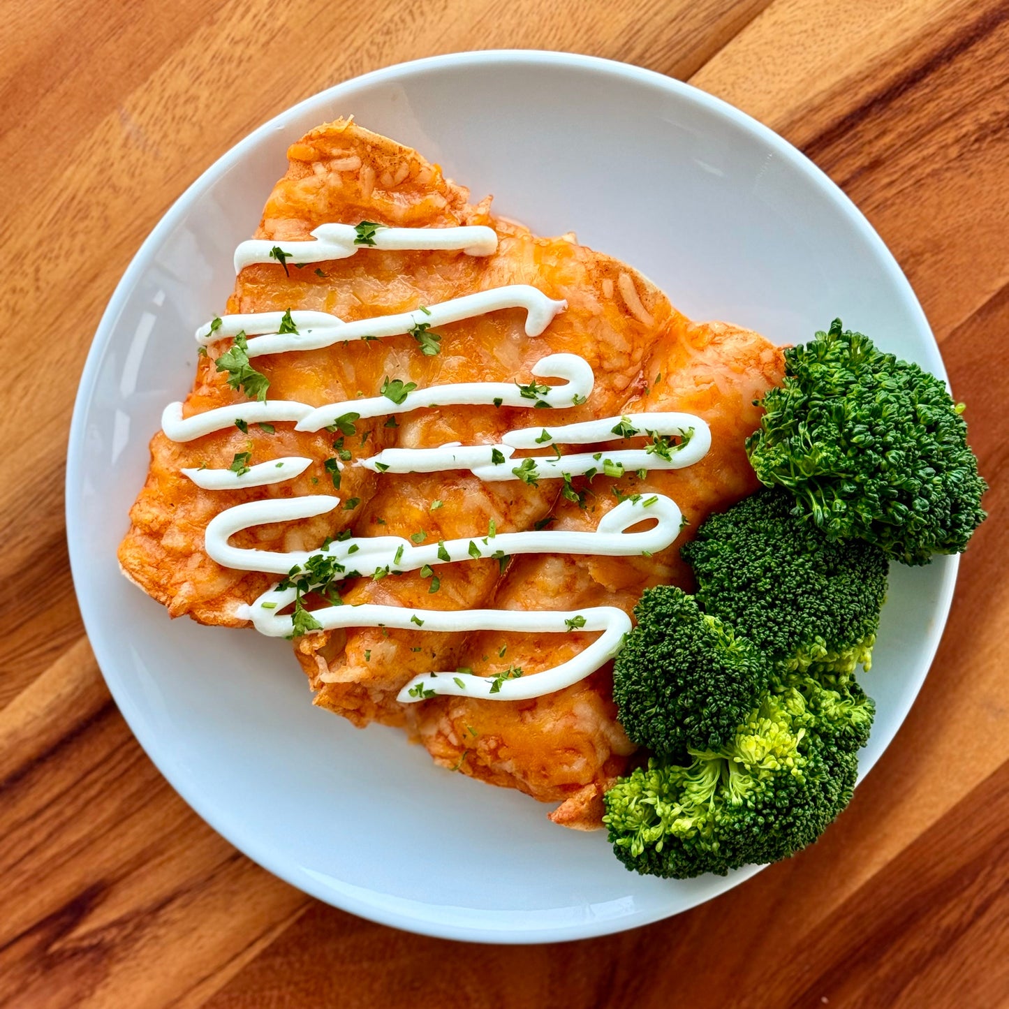 Ground Beef & Bean Corn Tortilla Enchiladas with Broccoli.